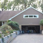 New Cedar siding, window trim, gutters, soffit, and fascia