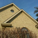 New soffit, fascia, freeze board, and gable trim. The old gutters originally on the house have not been replaced yet in this picture