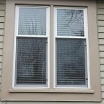 Replacement window with clay window trim