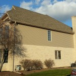 New siding, soffit, fascia, gutters, and window trim