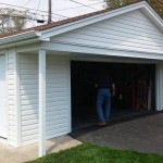 New siding, soffit and fascia, entry door, and garage window, and gable trim
