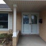 Completed front porch and newly capped post supporting the ceiling