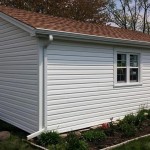 New siding, soffit and fascia, entry door, and garage window