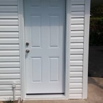 New entry door, siding, and soffit and fascia